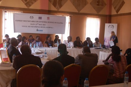 Participants at a juvenile justice roundtable in Uganda
